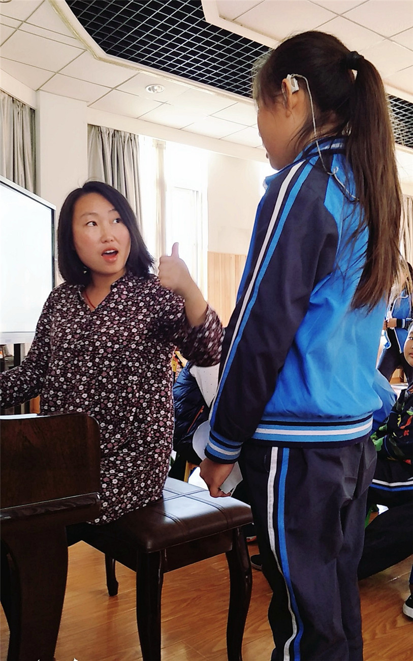 用音樂把小耳朵叫醒 聾兒音樂課開唱了